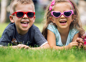 Shutterstock - Happy kids with funny glasses